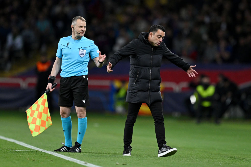 xavi blames 'disastrous' referee after barcelona crash out of champions league