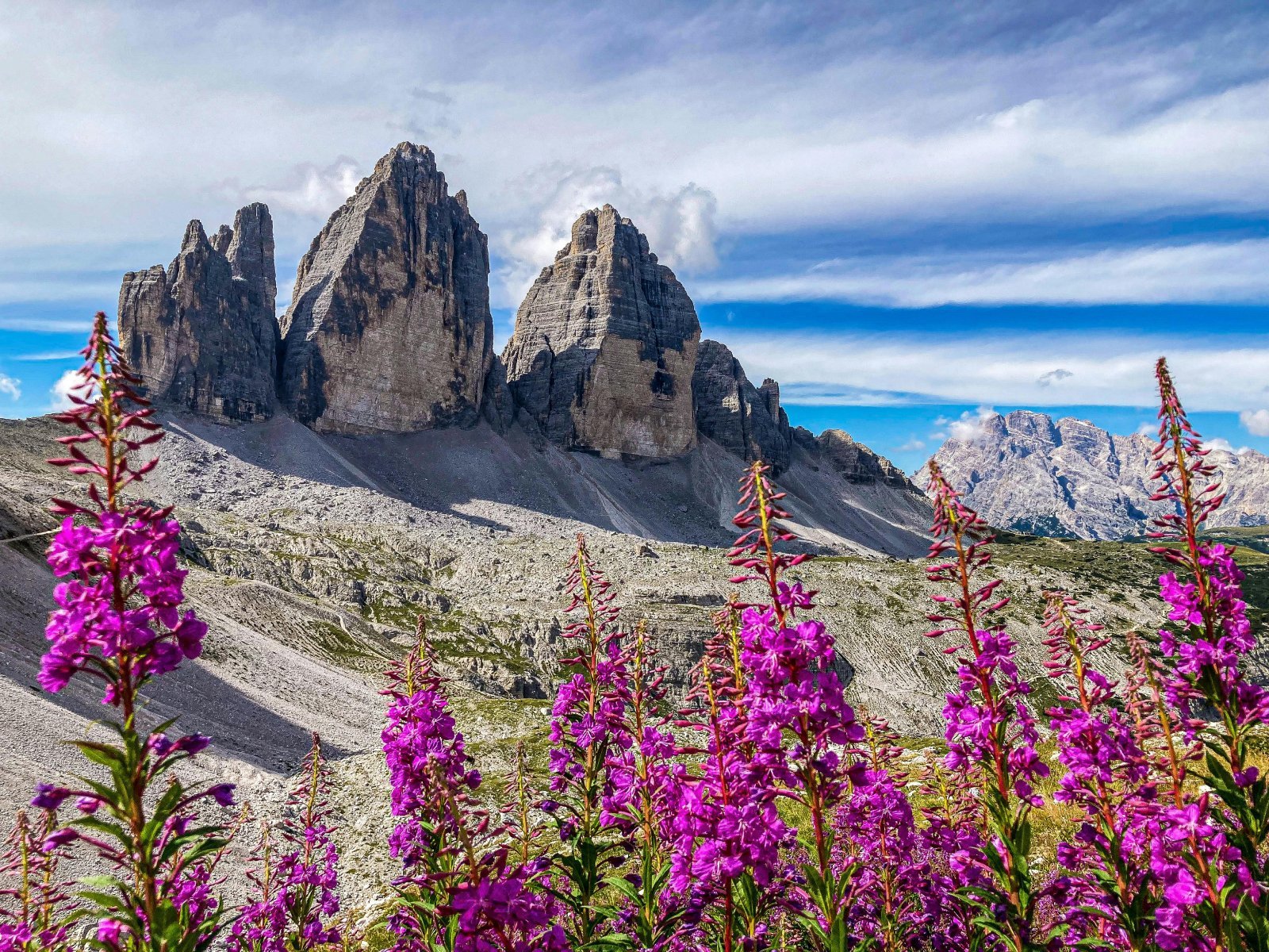 <p class="wp-caption-text">Image Credit: Pexels / Elia Pinzin</p>  <p><span>Tre Cime di Lavaredo, the three iconic battlement-like peaks, are synonymous with the Dolomites. The surrounding area offers some of the most accessible yet profoundly stunning hiking trails, providing panoramic views of the jagged mountain landscape. The circuit around the peaks is a moderate hike, allowing even those with limited mountaineering experience to immerse themselves in the heart of the Dolomites. Along the way, historical sites from World War I, including tunnels and fortifications, tell the story of the region’s past.</span></p>