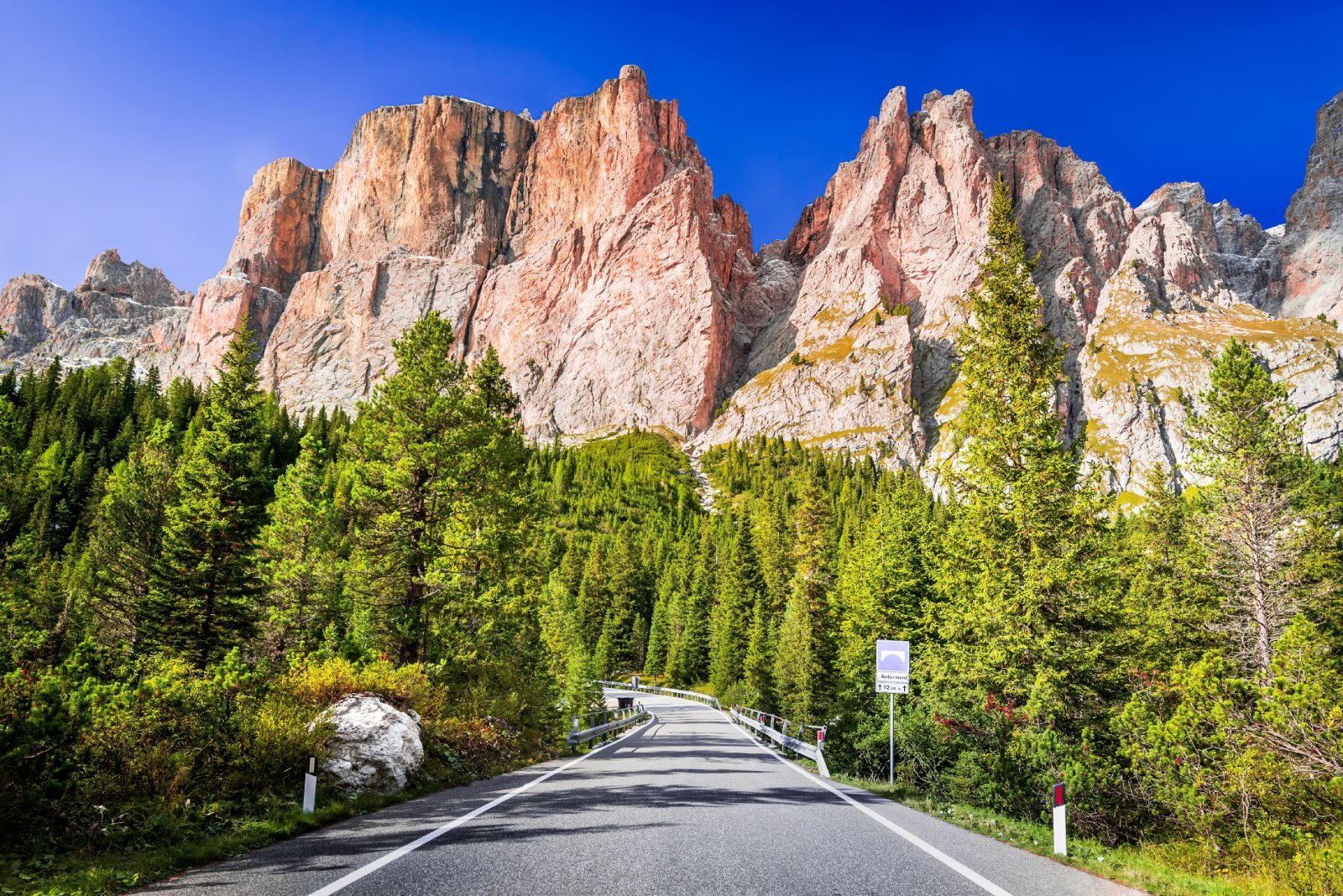 <p class="wp-caption-text">Image Credit: Shutterstock / ecstk22</p>  <p><span>The Sella Ronda, a circular ski route around the massif of the Sella group, is one of the most spectacular skiing experiences in the world. It connects four Ladin valleys – Val Gardena, Alta Badia, Val di Fassa, and Arabba – and can be completed in one day. The route offers diverse scenery and ski runs, suitable for intermediate skiers. In summer, the Sella Ronda becomes a challenging route for cyclists and a scenic drive for motorists.</span></p>