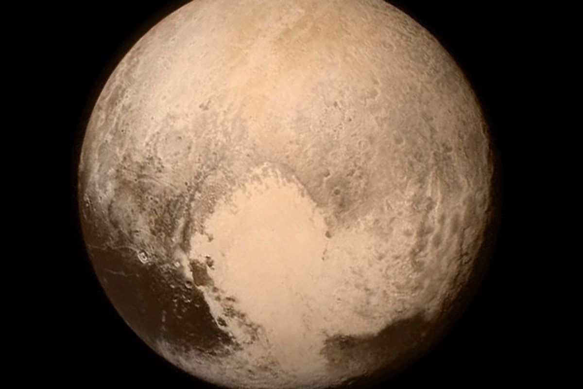 mystery of pluto's white heart has finally been solved