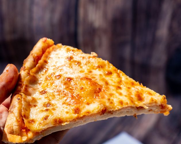 people are realising the best way to reheat pizza, and it's not in the oven