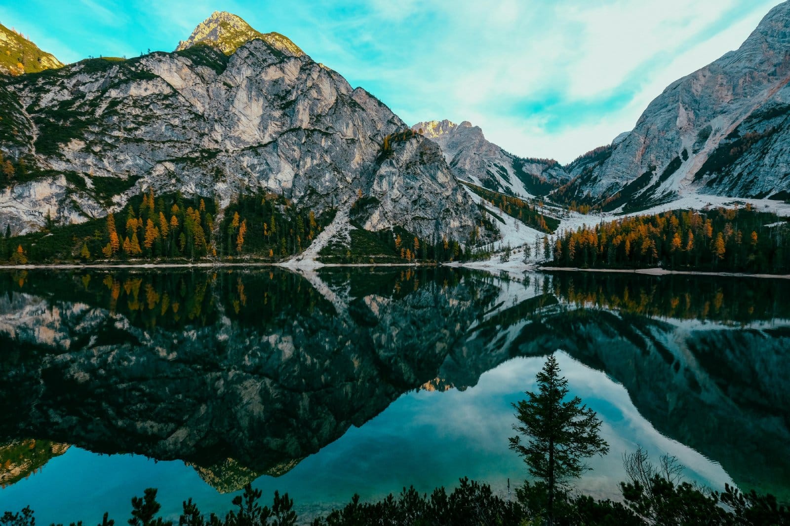 <p class="wp-caption-text">Image Credit: Pexels / Francesco Ungaro</p>  <p><span>Lake Braies, known as Pragser Wildsee in German, is a pristine alpine lake nestled in a valley surrounded by forested mountains. Its emerald waters reflect the towering peaks, making it one of the most photographed spots in the Dolomites. Visitors can enjoy a leisurely walk around the lake or rent a traditional wooden boat to paddle the tranquil waters. The lake is also a starting point for several hiking trails, including paths leading to the Fanes-Sennes-Braies National Park.</span></p>