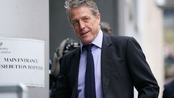 hugh grant settles claim against sun publisher due to risk of €11.7m legal costs