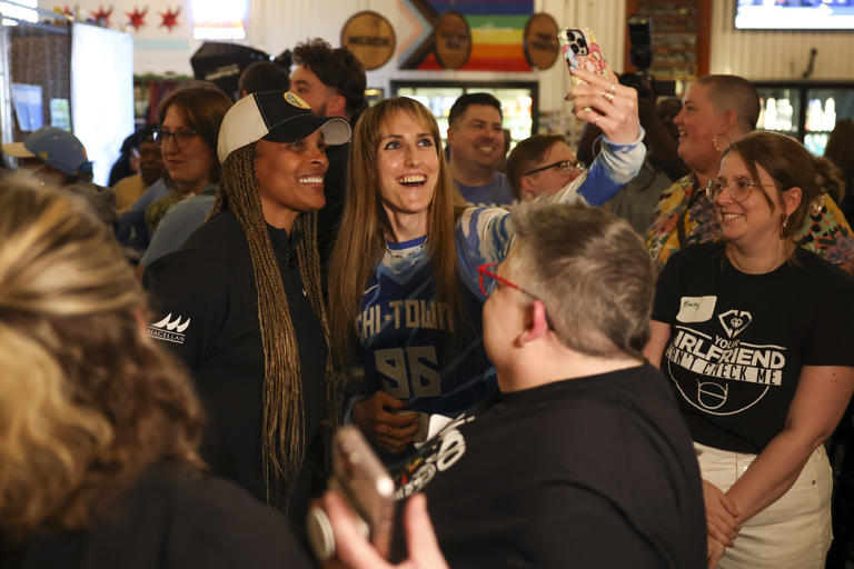 Aerie Van Meter takes a selfie with Chicago Sky head coach Teresa Weatherspoon during the Sky’s WNBA draft watch party at Revolution Brewing in Chicago on April 15, 2024.