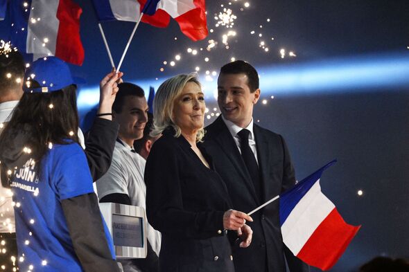 disaster for emmanuel macron as rival marine le pen storms ahead in shock election poll