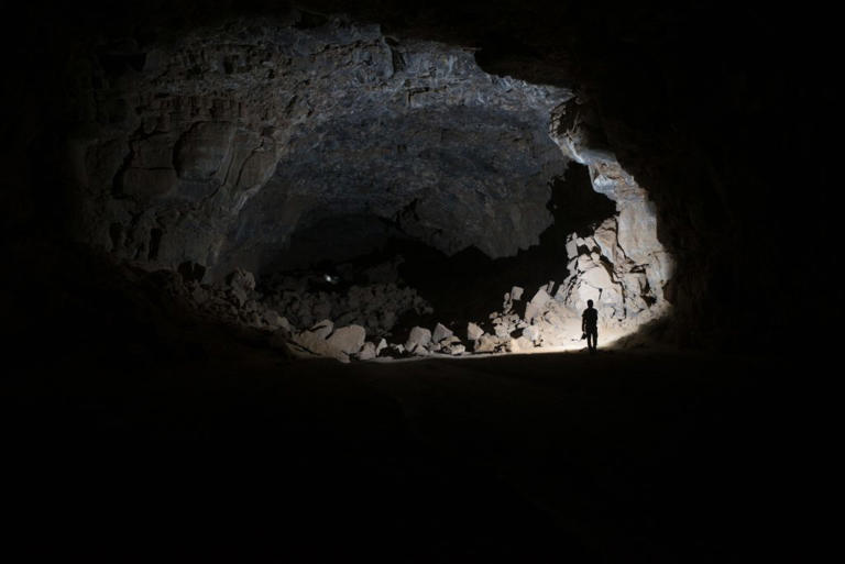 Researchers exploring the Umm Jirsan Lava Tube system. (PALAEODESERTS Project, CC-BY 4.0 via SWNS)