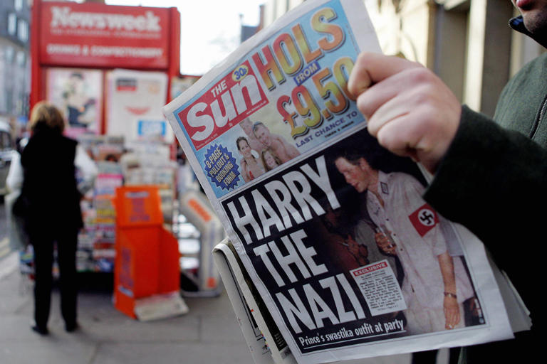 Prince Harry is seen wearing a Nazi uniform on the front page of The Sun newspaper on January 13, 2005. Harry is suing the newspaper and its publisher News Group Newspapers on historic allegations of phone hacking. JIM WATSON/AFP via Getty Images