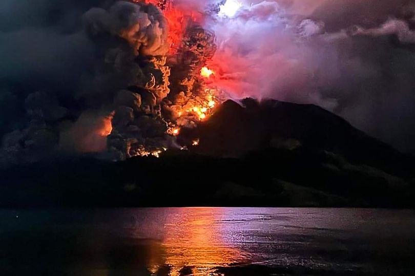 indonesia tsunami alert after 'ring of fire' volcano erupts several times - with 11,000 evacuated