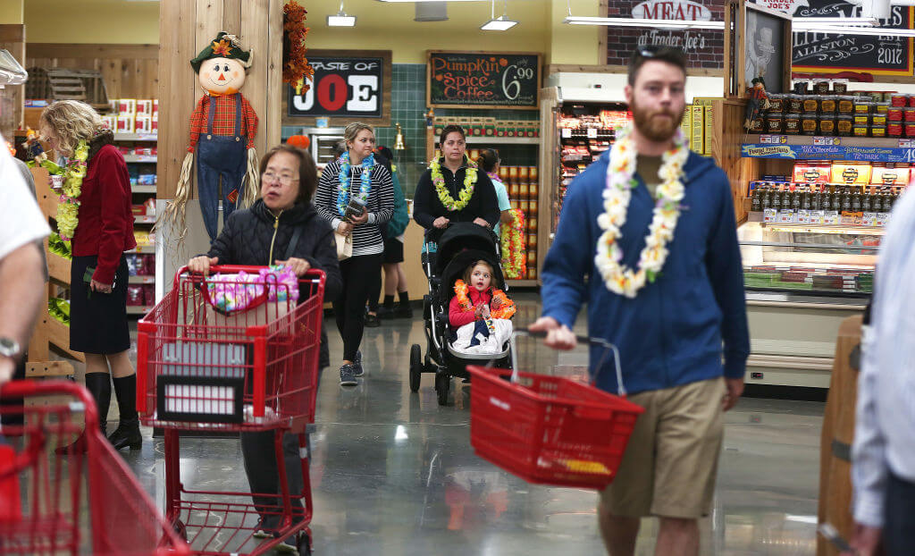 <p>There is a 'Joe' behind Trader Joe's after all. The grocery store chain's founder, Joe Coulombe, opened the first Trader Joe's location in Pasadena, California, in 1967. Coulombe is a big fan of Hawaiian shirts and laid-back beach living, so he decided to make that the theme of the store. </p> <p>As we know, it's since been carried across all Trader Joe's locations. Employees of the chain wear Hawaiian Aloha shirts, and sometimes leis, and the decor around the store is all Tiki and nautical. Many employees admit they often feel like they're working on a ship.</p>