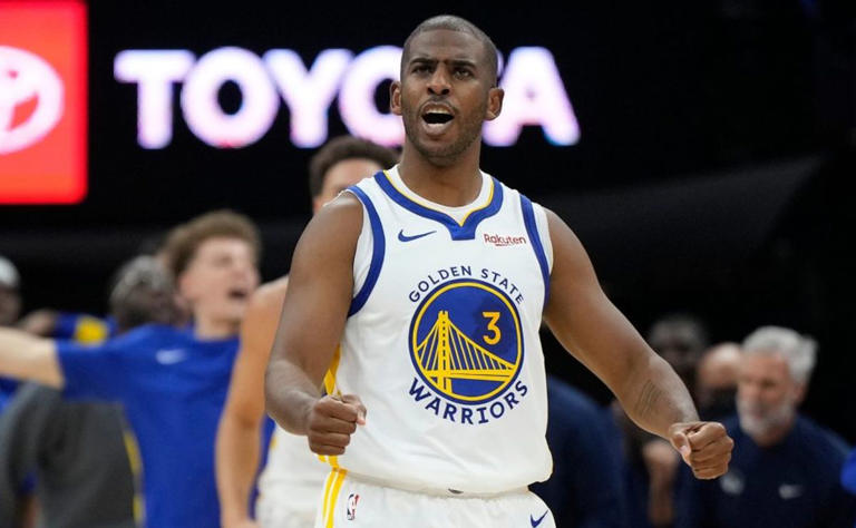 Chris Paul celebrates after scoring for the Golden State Warriors