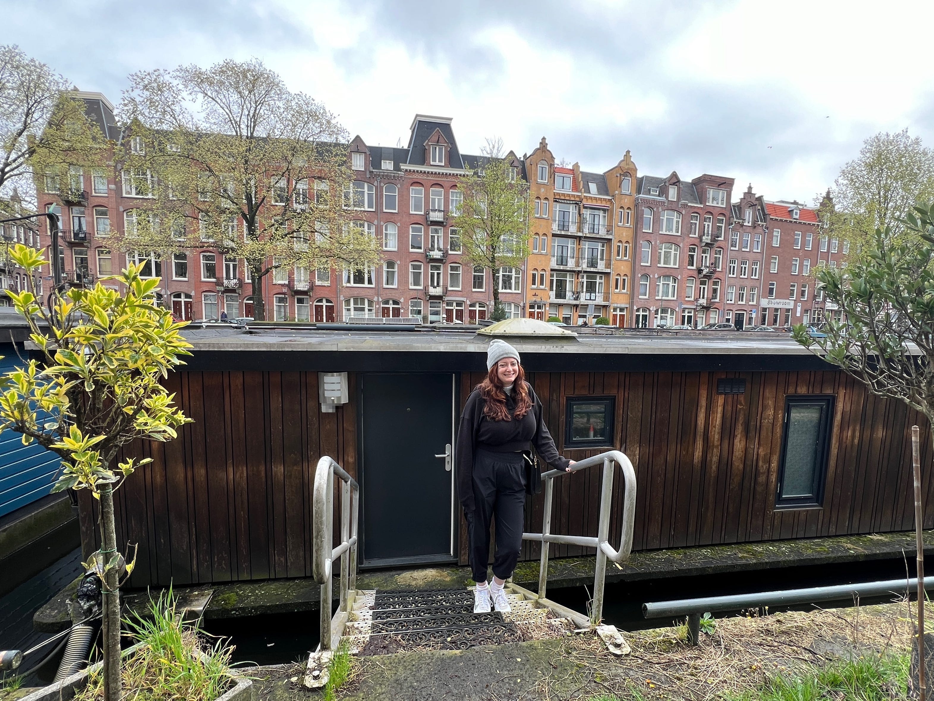<ul class="summary-list"><li>I stayed in a houseboat in <a href="https://www.businessinsider.com/category/amsterdam">Amsterdam</a> for four nights.</li><li>The houseboat cost $2,802.55 after taxes and fees, or roughly $700 per night on Airbnb.</li><li>Even though it was on the pricier side, it was worth it to live like a local for a few days.</li></ul><p>One of the first things you notice about Amsterdam when you visit is that there are canals everywhere — and in many of those canals are <a href="https://www.businessinsider.com/photos-houseboat-interiors-2020-6">houseboats</a>.</p><p>When I took a trip in April 2024 with my parents to visit my brother studying abroad, I knew I wanted to stay in a houseboat for at least part of our trip since houseboats are so distinctly Dutch.</p><p>The Dutch have lived on boats as early as the 17th century. As the <a href="https://www.washingtonpost.com/climate-solutions/interactive/2021/amsterdam-floating-houses-schoonschip/">Washington Post</a> noted, the Netherlands is "waterlogged" — one-third of the country is below sea level, and efforts to drain water from the land date back to the Middle Ages.</p><p><a href="https://www.nytimes.com/2019/11/04/realestate/in-amsterdam-floating-homes-that-only-look-like-ships.html">The New York Times</a> reported there are about 10,000 houseboats in the Netherlands, and 2,500 of them are in Amsterdam. The space in an Amsterdam canal alone — that is, without a boat — costs nearly $500,000.</p><p>And houseboats themselves are only getting more expensive. Real-estate agent Jon Kok told the Times in 2019 that the prices of houseboats had increased between 30 and 40 percent in the five years prior.</p><p>Over the course of 10 days in Amsterdam, I stayed in two <a href="https://www.businessinsider.com/airbnb-superhost-uses-real-estate-financial-freedom-2024-4">Airbnbs</a>. Our first was inside an apartment on land, and our second was a houseboat that came to around $700 a night after taxes, cleaning, and service fees.</p><p>Our first Airbnb, which we stayed in for five nights, cost $2,442 in total. It was nice but not too different from the many other Airbnbs I've stayed in.</p><p class="p1">While more expensive, the houseboat was a completely new experience for the four nights. I've never taken a cruise, so this was the first time I've ever slept on the water. I was nervous about potentially getting seasick but decided the uniqueness of staying on a houseboat outweighed the potential nausea, which I thankfully didn't experience.</p><p>Here's what it was like to stay in an Amsterdammer's houseboat.</p><div class="read-original">Read the original article on <a href="https://www.businessinsider.com/photos-amsterdam-airbnb-houseboat-2024-4">Business Insider</a></div>