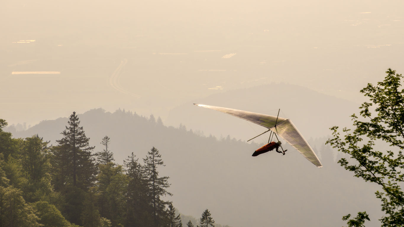 Tennessee's Sequatchie Valley is known as the the "Hang Gliding Capital of the East" and offers adrenaline junkies the chance to soar over mesmerizing hills, lush forests, cliffs and rivers year-round. "There is no engine. There is no noise. This is as close as you can get to flying like a bird," <a href="https://tnhomeandfarm.com/travel/destinations/visit-the-sequatchie-valley/" title="says Dan Shell">says Dan Shell</a>, a longtime board member with Tennessee Tree Toppers.