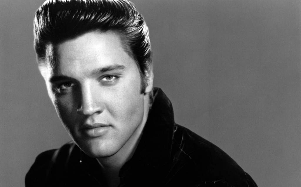A song that sounds as good today as it did in 1957, "All Shook Up" remains another timeless Elvis Presley hit. This track not only soared to the top of the pop, R&B, and country charts but also stayed in the Top Ten for an impressive 15 weeks, with eight of those at number one. Its catchy lyrics and infectious rhythm made it Billboard’s Number One song of 1957, with Elvis's unique ability to blend genres into a universally compelling sound. "All Shook Up" is Elvis at his most charismatic, with a performance that could make anyone's knees weak and hips sway -- proving why he was -- and still is -- the King of Rock 'n' Roll.