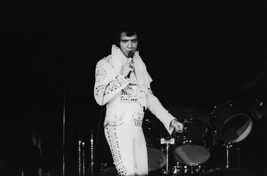 The cycle of pain and suffering expressed in "In the Ghetto" is rendered in a style that only Elvis could pull off, capturing the raw emotions and realities of life in a Chicago ghetto. Released in 1969, the song marks a shift in Elvis' career, as it showed his ability to tackle serious social issues -- a departure from his less serious, playful lyrics. Its narrative tells the tale of a young boy born into poverty, growing up only to perpetuate the same cycle of violence and despair. This track became one of Elvis' most powerful hits, peaking at number three in the U.S.