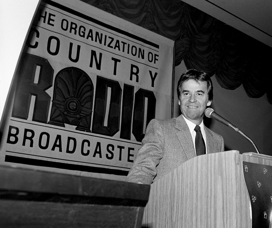 Dick Clark, who made his fortune in rock and roll but has a list of country music credentials too, makes the keynote speech to an audience of over 600 during the 13th annual Country Radio Seminar at the Opryland Hotel Feb. 26, 1982. Clark predicted a solid future for country music and announced his own country radio network debuting June. 1.