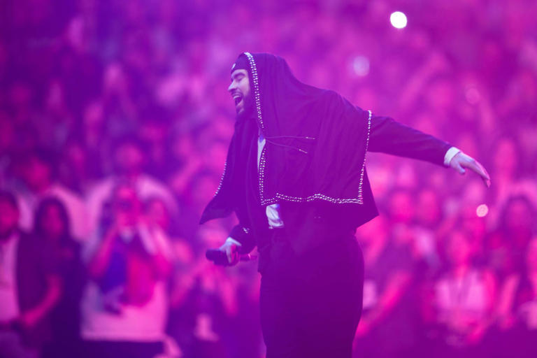 Bad Bunny performs during the Most Wanted tour at American Airlines Center on Thursday in Dallas.