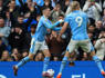 Haaland nets four as Man City keep pace in title race<br><br>