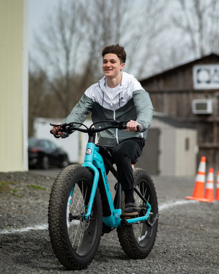 Daniel Trevisani Jr. test drives an electric bicycle at the new eBliss Experience Center in Clinton, NY on Saturday, April 27, 2024.