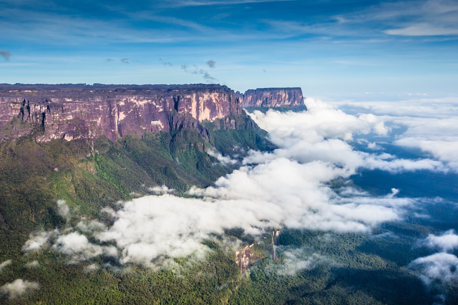 <p class="wp-caption-text">Image Credit: Shutterstock / Curioso.Photography</p>  <p>Embark on an epic trek to the summit of Mount Roraima, the towering tepui that inspired Sir Arthur Conan Doyle’s “The Lost World.” Traverse rugged terrain, cross sheer cliffs, and camp atop this otherworldly plateau for a once-in-a-lifetime adventure.</p>