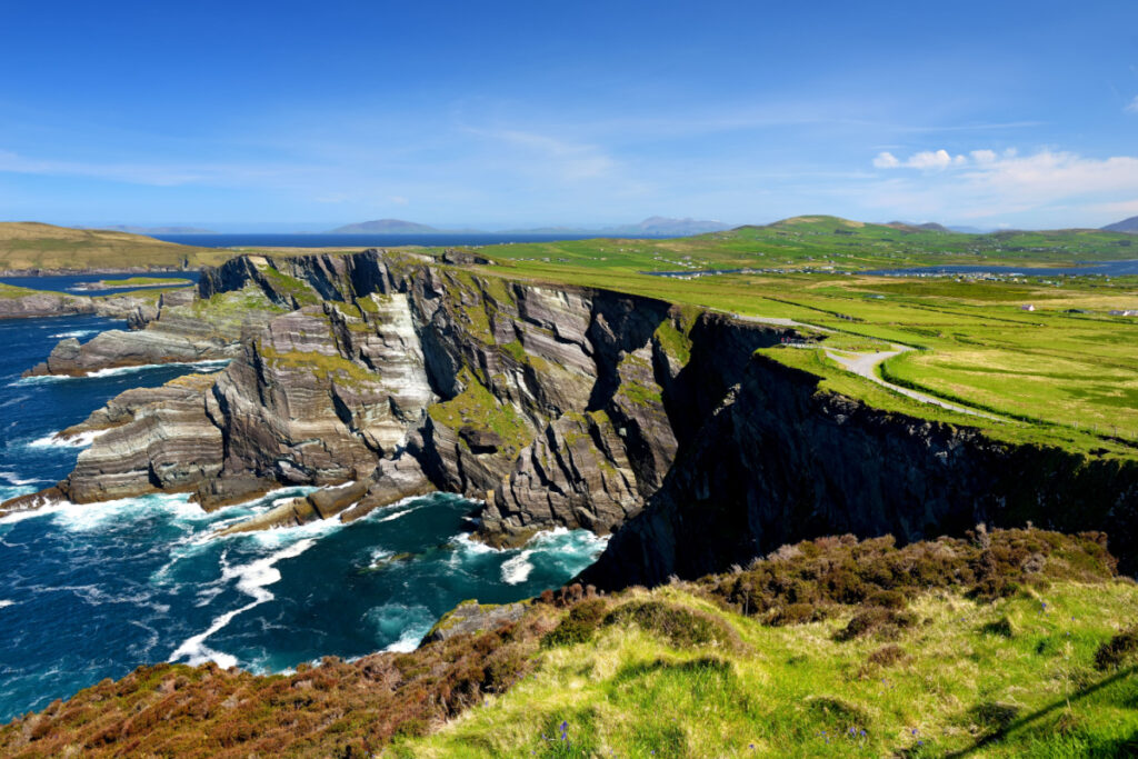 <p>The Ring of Kerry in southwest Ireland provides a circular route of 179 kilometers, covering some of the country’s most outstanding scenery. The route passes through charming villages, rugged cliffs, ancient monuments, and panoramic viewpoints overlooking the Atlantic Ocean. The diverse landscapes, rich history, culture, and Irish hospitality make this route an unforgettable journey.</p>