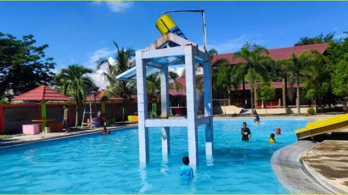 rekreasi di kolam renang boliyohuto gorontalo,ada zona bermain anak hingga resto