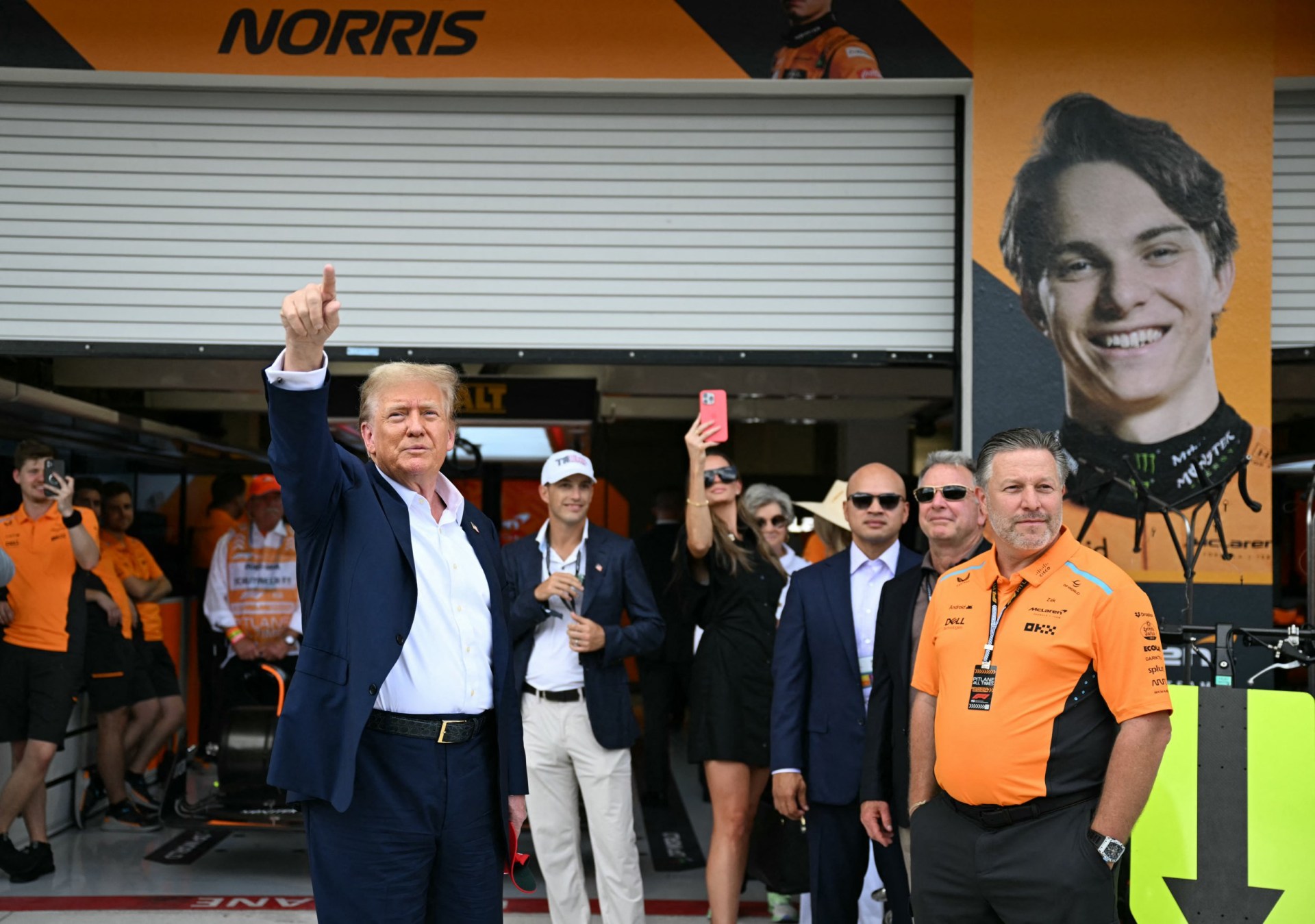 donald trump attends miami grand prix after his $250,000-a-ticket fundraiser was shut down
