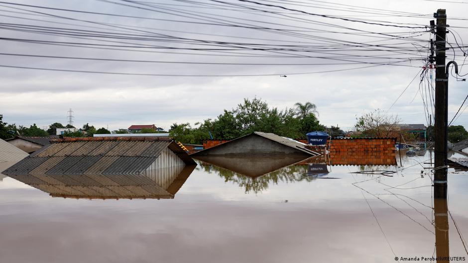 brazil floods: rescuers race against time as death toll rises