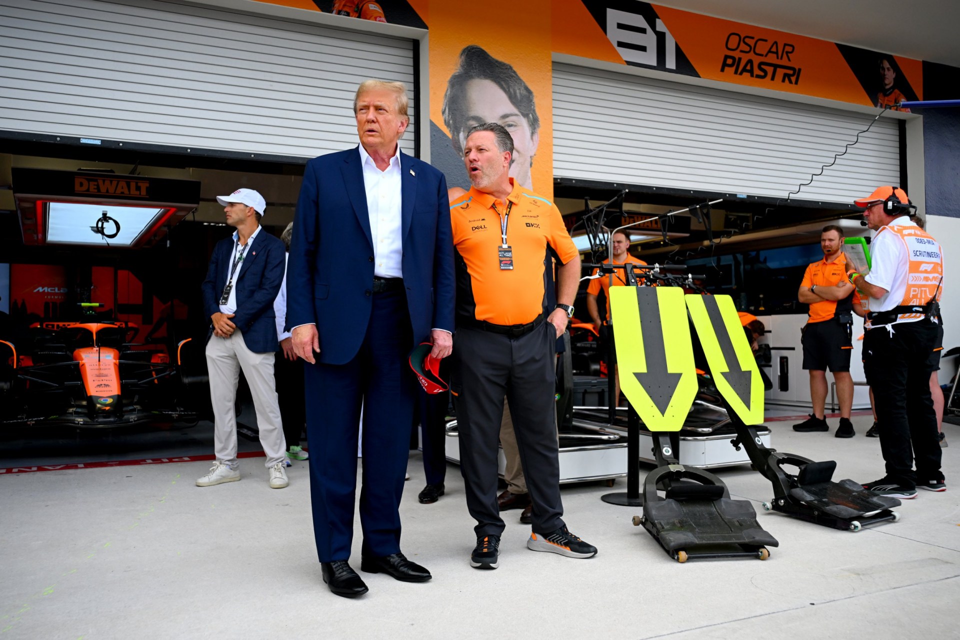 donald trump attends miami grand prix after his $250,000-a-ticket fundraiser was shut down