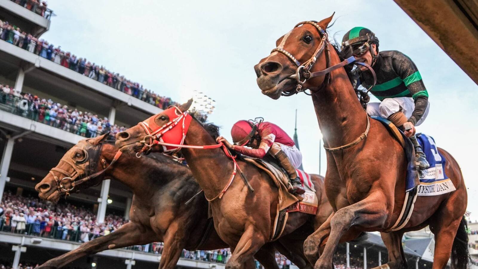 Mystik Dan, right, wins the Kentucky Derby in a photo finish on Saturday, May 4, 2024.