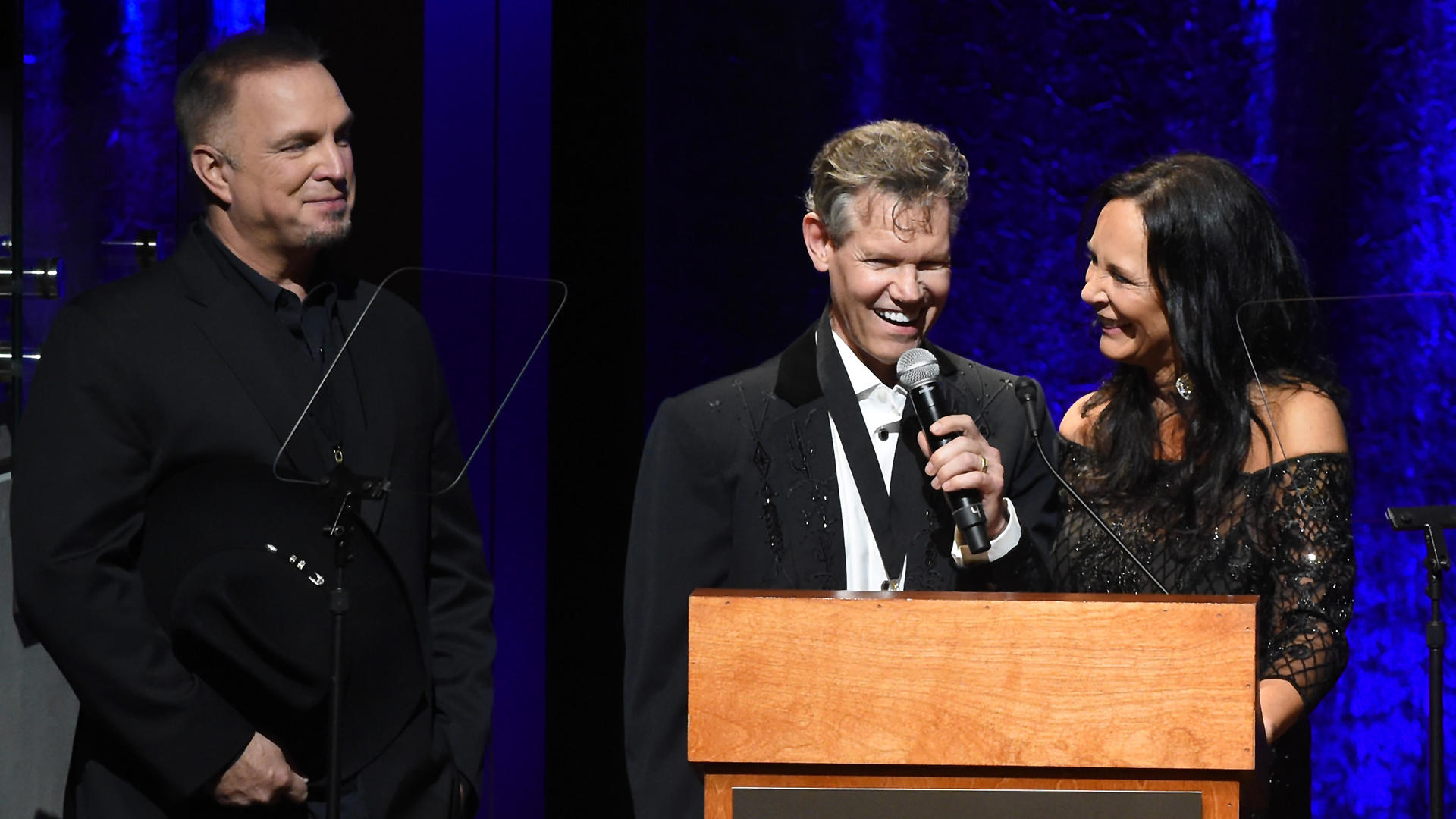 more than a decade after a stroke, randy travis sings again, courtesy of ai