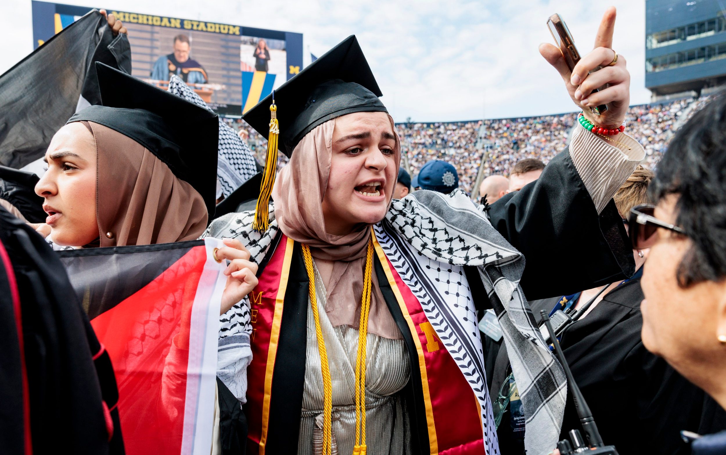 student protesters disrupt university of michigan graduation