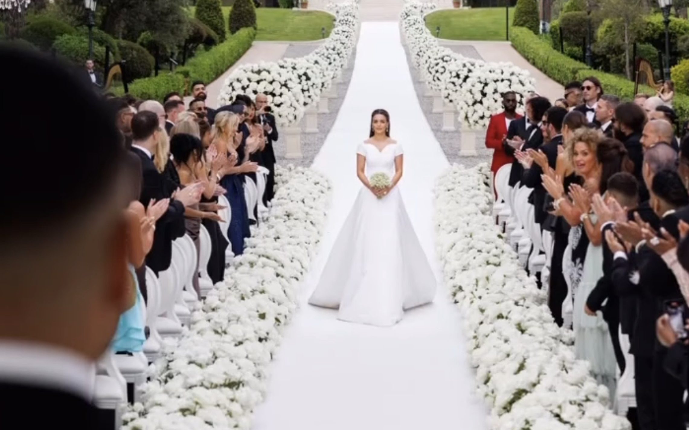 black friday, fast fashion mogul weds model whose dior gown took 540 hours to make