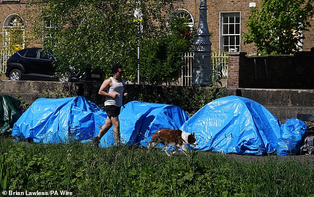 migrants pitch dozens of tents along the banks of dublin's grand canal