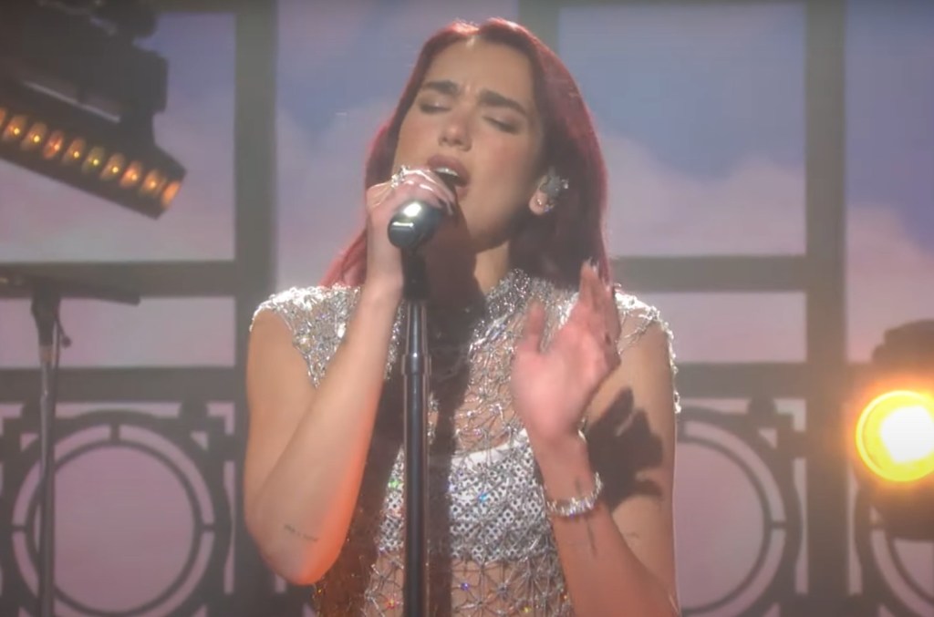 dua lipa performs ‘radical optimism' songs while pulling double duty as ‘snl' host & musical guest