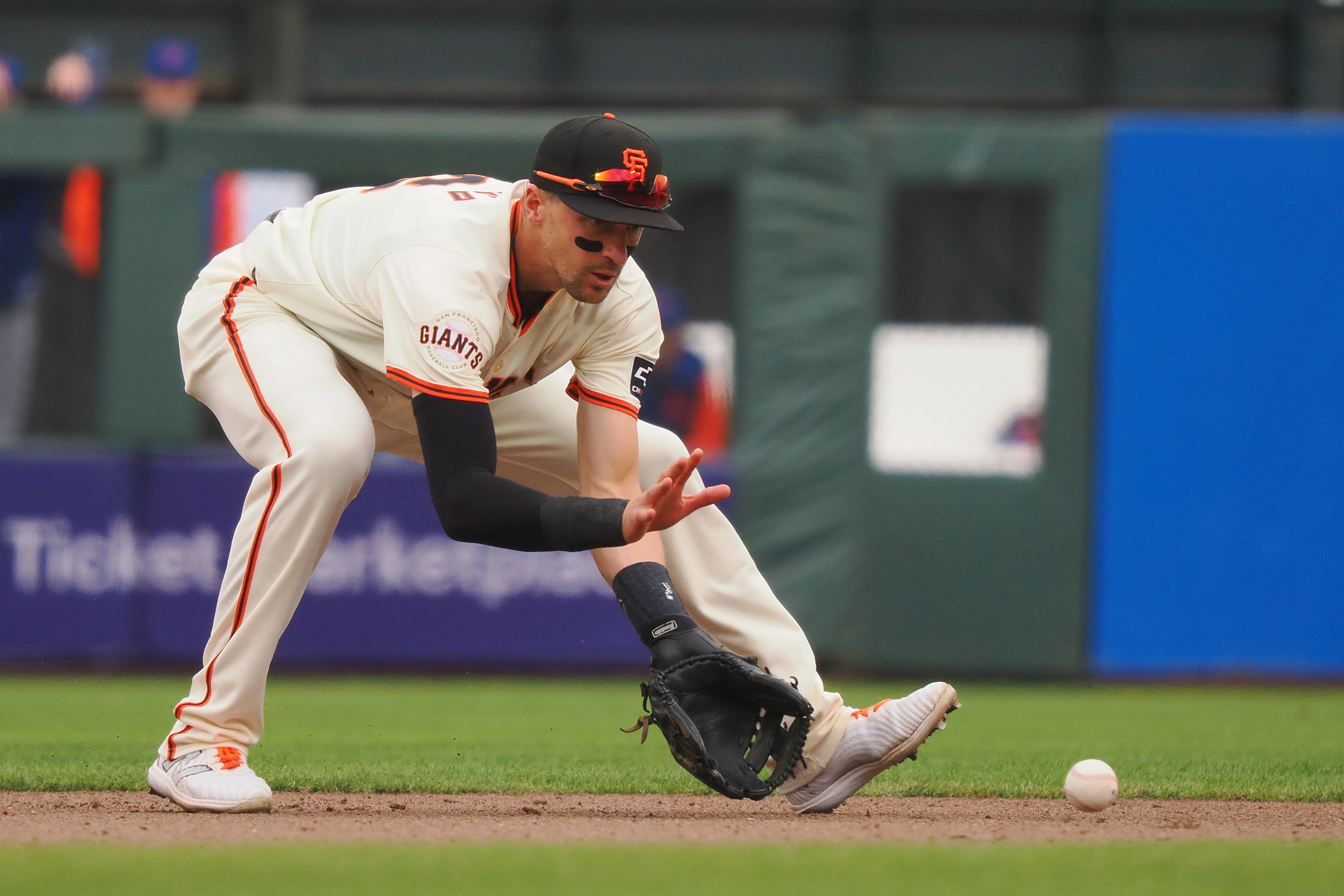 watch: giants shortstop airmails throw on routine grounder
