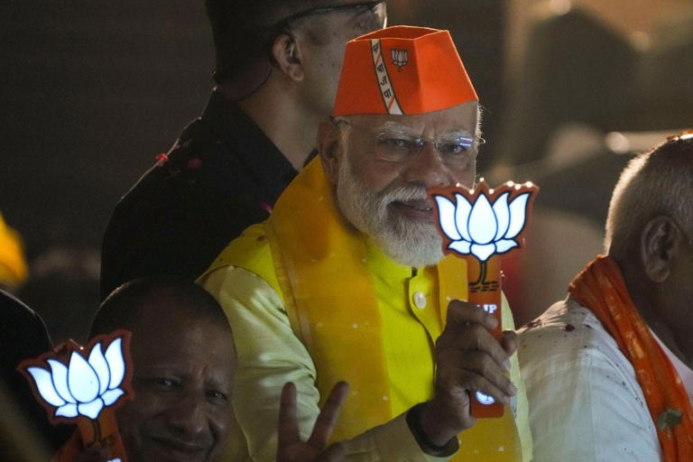 PM Narendra Modi during a roadshow for Lok Sabha elections, in Ayodhya on May 5. (Image: PTI/Arun Sharma)
