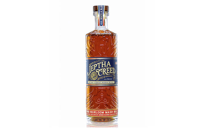 We review Jeptha Creed Red, White & Blue Kentucky Straight Bourbon, distilled from three corn types, malted rye, and malted barley, before being aged at least four years. (image via Jeptha Creed)