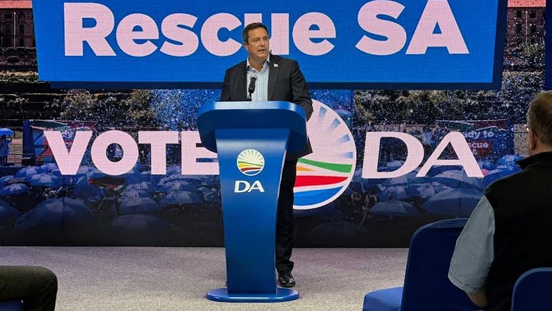 ‘what message are you sending’: da receives backlash over its “burning sa flag” election tv ad