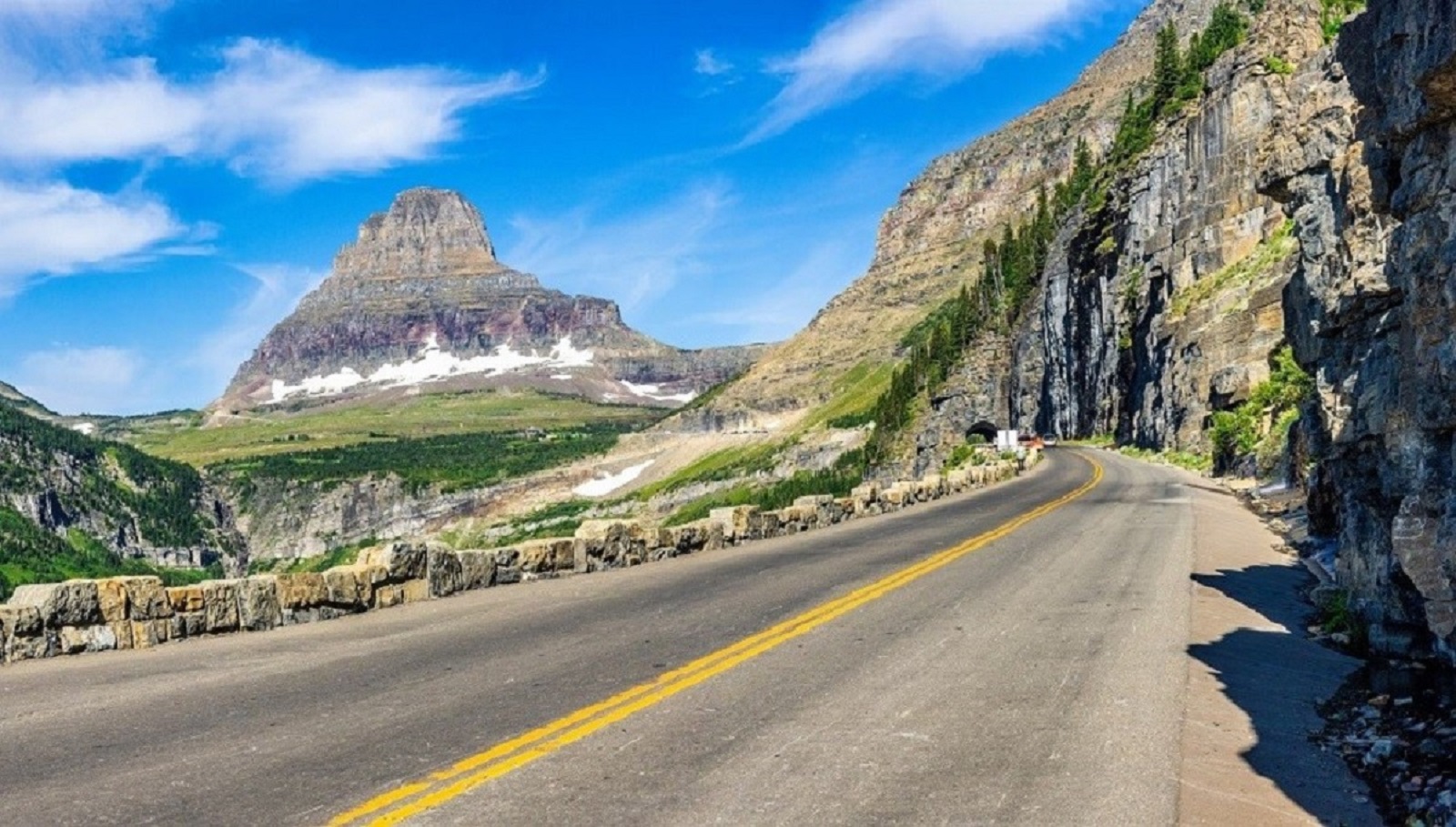 <p class="wp-caption-text">Image Credit: Shutterstock / Mihai_Andritoiu</p>  <p><span>Venture into the heart of Glacier National Park on Going-to-the-Sun Road, a scenic drive that winds through towering mountains and alpine meadows. With hairpin turns and awe-inspiring vistas, it’s a must-visit destination for any car lover seeking adventure.</span></p>