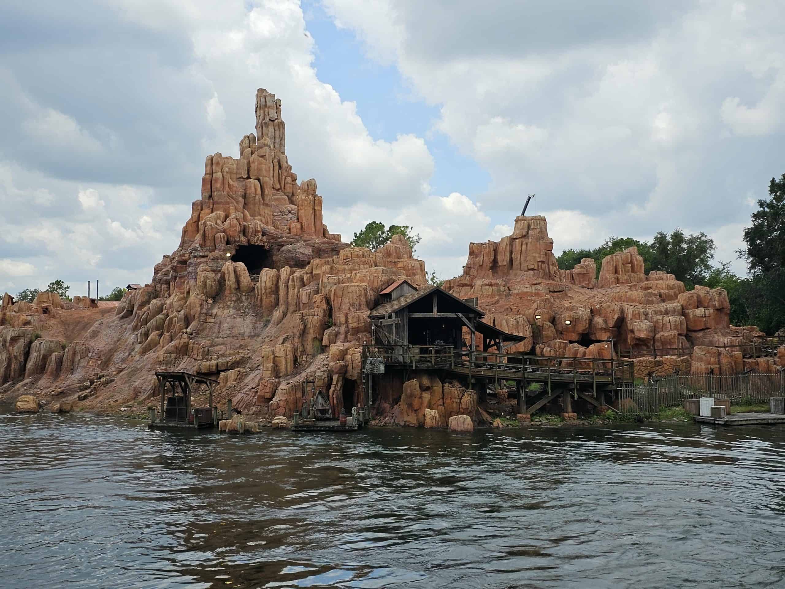 <p>A trip to Disney World wouldn't be complete without taking a ride on Big Thunder Mountain Railroad. The outdoor roller coaster can be tracked down in Frontierland, which is a special to folks who appreciate the iconic wild west theme. Big Thunder Mountain Road is considered a thrill ride with a few small drops. It has a height requirement of 40 inches or taller. The tunnels built throughout the ride make you feel like you're experiencing a true old-school train trip.</p>