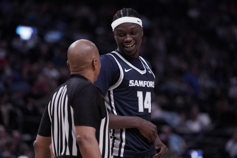 Mar 21, 2024; Salt Lake City, UT, USA; Samford Bulldogs forward Achor Achor (14) talks to an official during the second half in the first round of the 2024 NCAA Tournament against the Kansas Jayhawks at Vivint Smart Home Arena-Delta Center. Mandatory Credit: Gabriel Mayberry-USA TODAY Sports