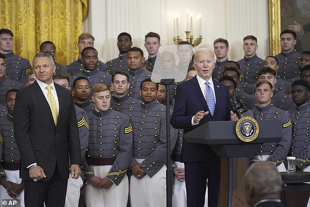 biden awards trophy to army and asks 'where are you, coach?'