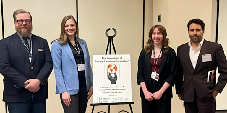 ASU economics students take research projects to national conference