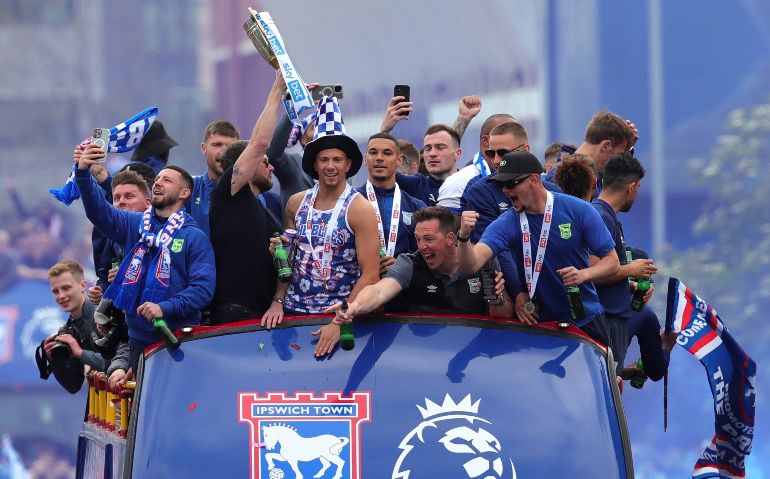 ipswich take aim at sky sports pundit and leeds during promotion parade