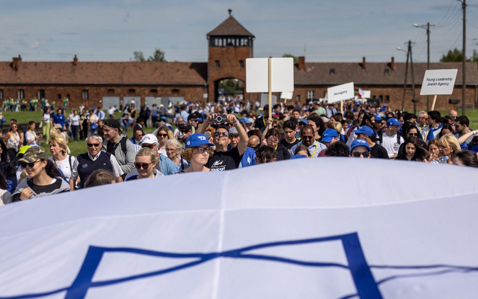 pro-palestinian protesters heckle holocaust memorial march at auschwitz