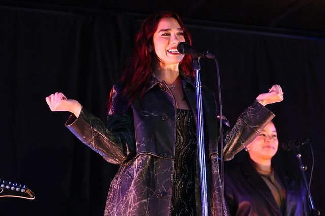 dua lipa performs surprise pop-up concert in new york city's times square — watch