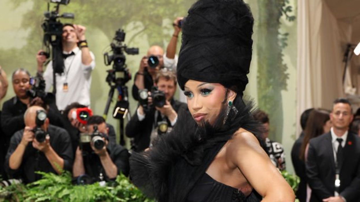cardi b goes viral after charging her phone on the met gala red carpet