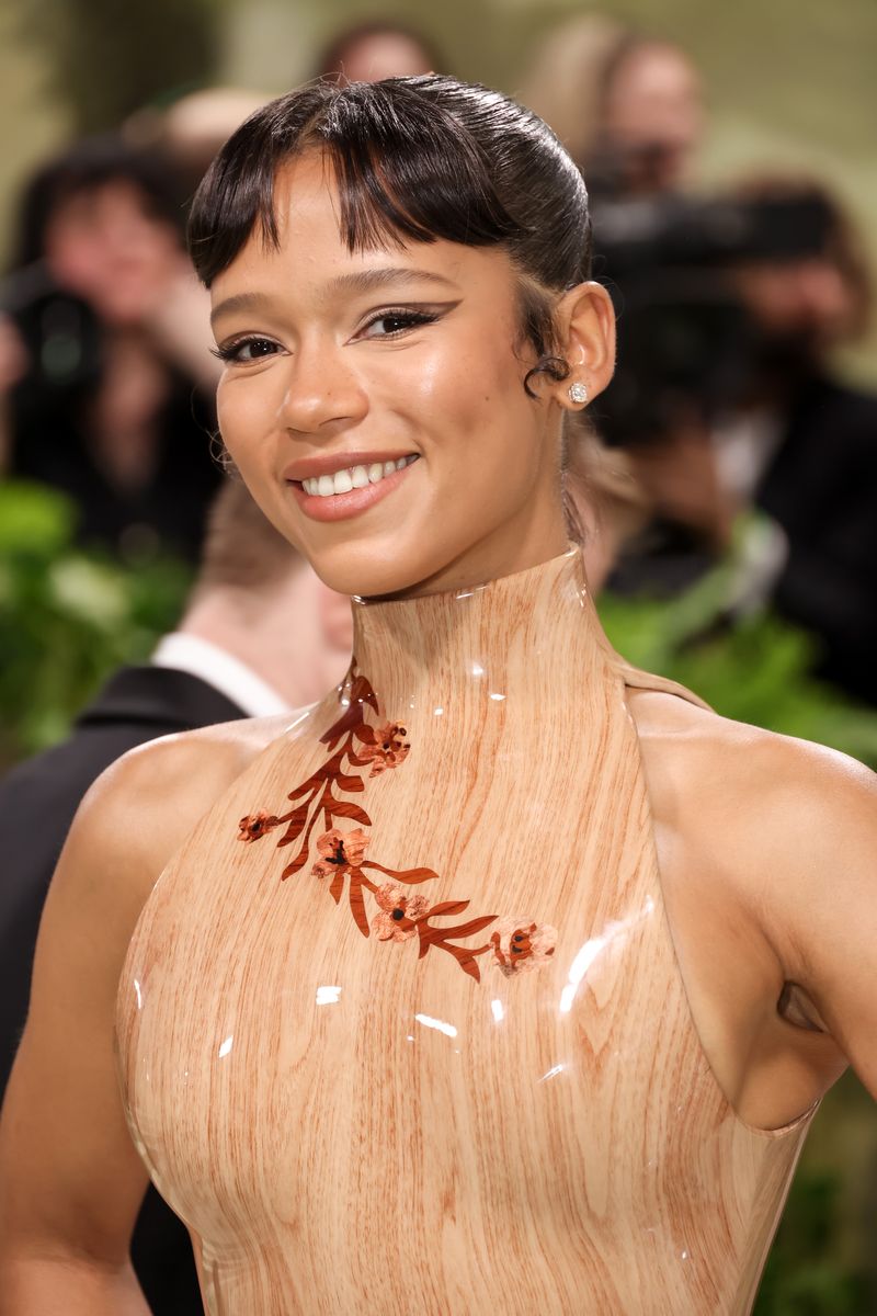 taylor russell looks like a walking sculpture in a body-cast bodice and skirt at the 2024 met gala