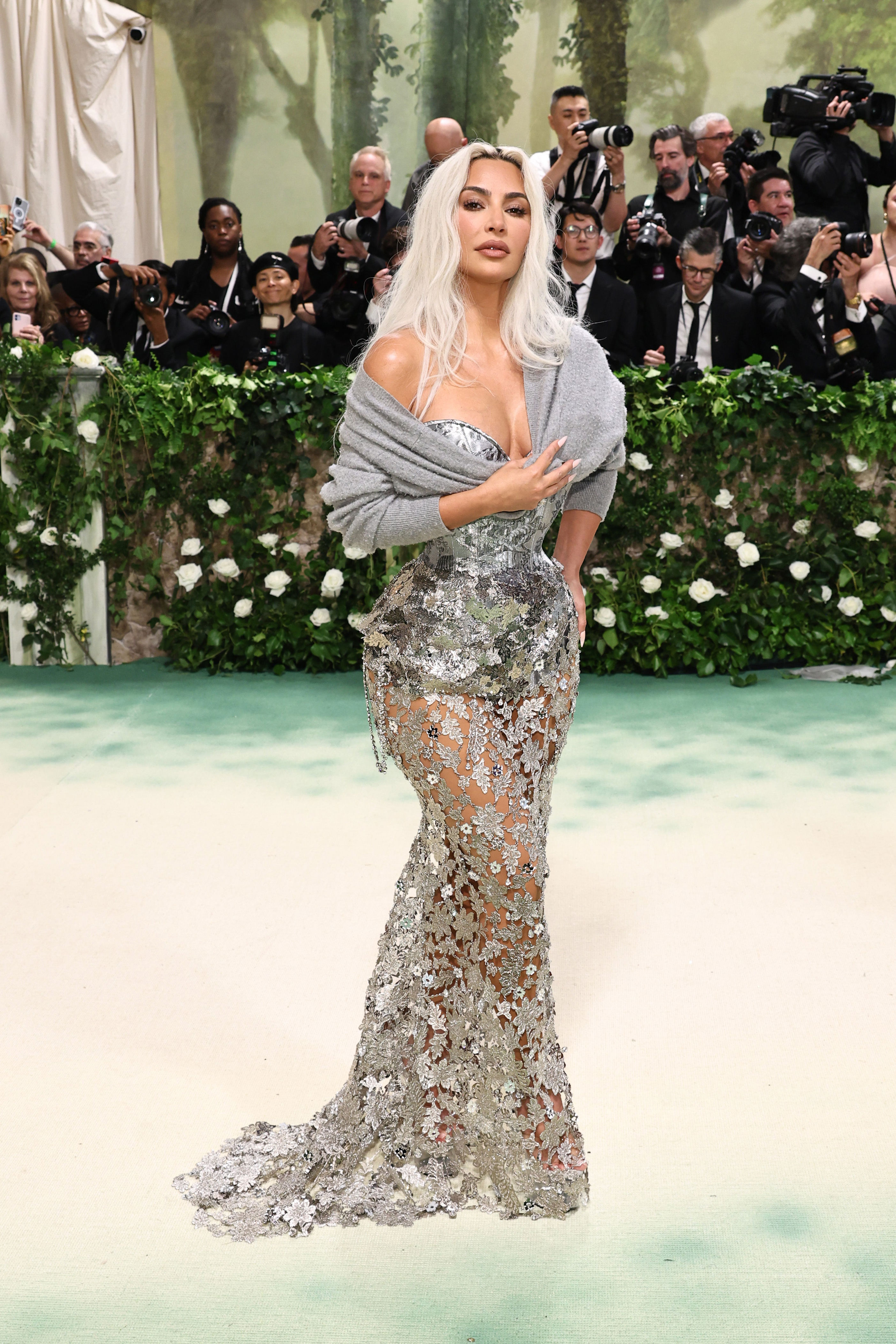kim kardashian reveals why she wore grey cardigan to met gala after accessory confused fans