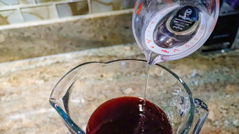 Easy to make, this red sangria is perfect for a fiesta or sitting by ...